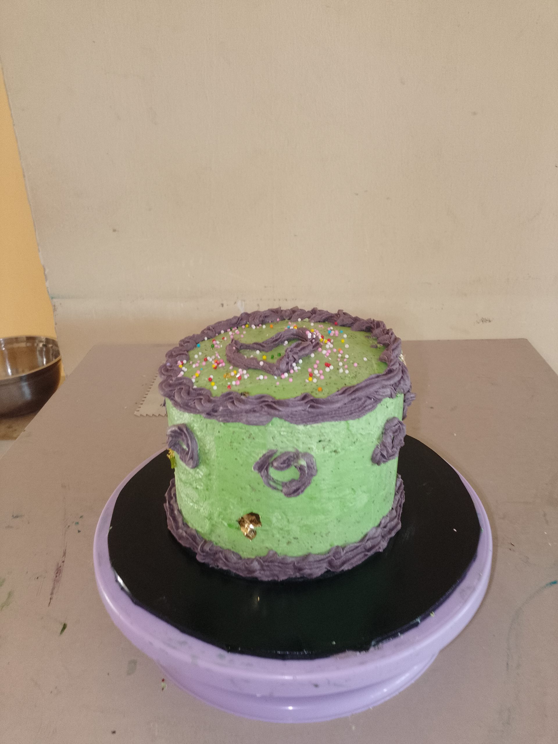 IMG_20260506_105307_583 Green decorated cake